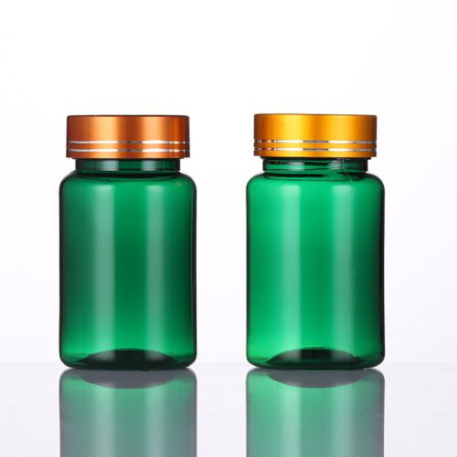 Frascos de color verde, para pastillas de 80ml.